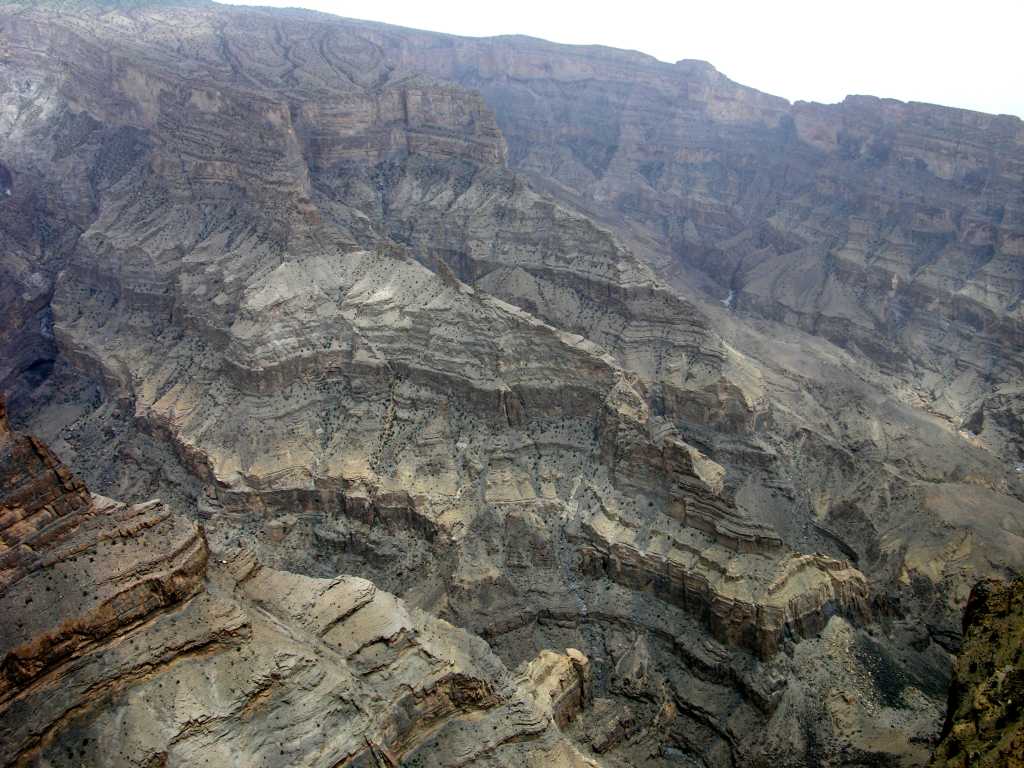 Muscat 07 10 Jebel Shams Canyon Wide View Jebel Shams is Omans highest mountain (3075m) and means Mountain of the Sun. It is best known for its spectacularly deep Wadi Ghul lying alongside it, making it the Grand Canyon of Oman.